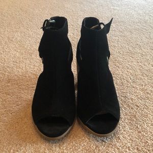 Women’s black suede bootie